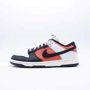Tenis Nike Dunk Low para hombre, en colores blanco, negro y coral rojizo. Diseño clásico en cuero premium.