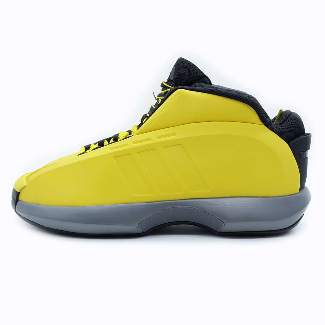 Tenis Adidas Crazy 1 Sunshine para hombre. Silueta de baloncesto retro con un diseño aerodinámico en color amarillo brillante y mediasuela gris.