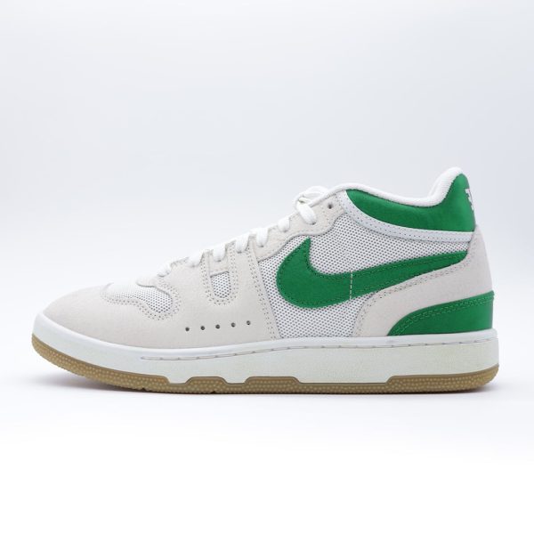 Tenis unisex Nike Mac Attack en colaboración con Social Status. Diseño retro de corte medio en color verde y malla blanca.
